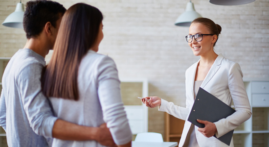 image of couple seeing financial consultant 